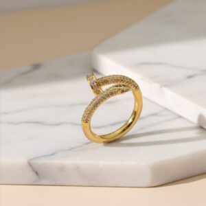 Gold Plated Nail Shaped AD Studded Adjustable Finger Ring